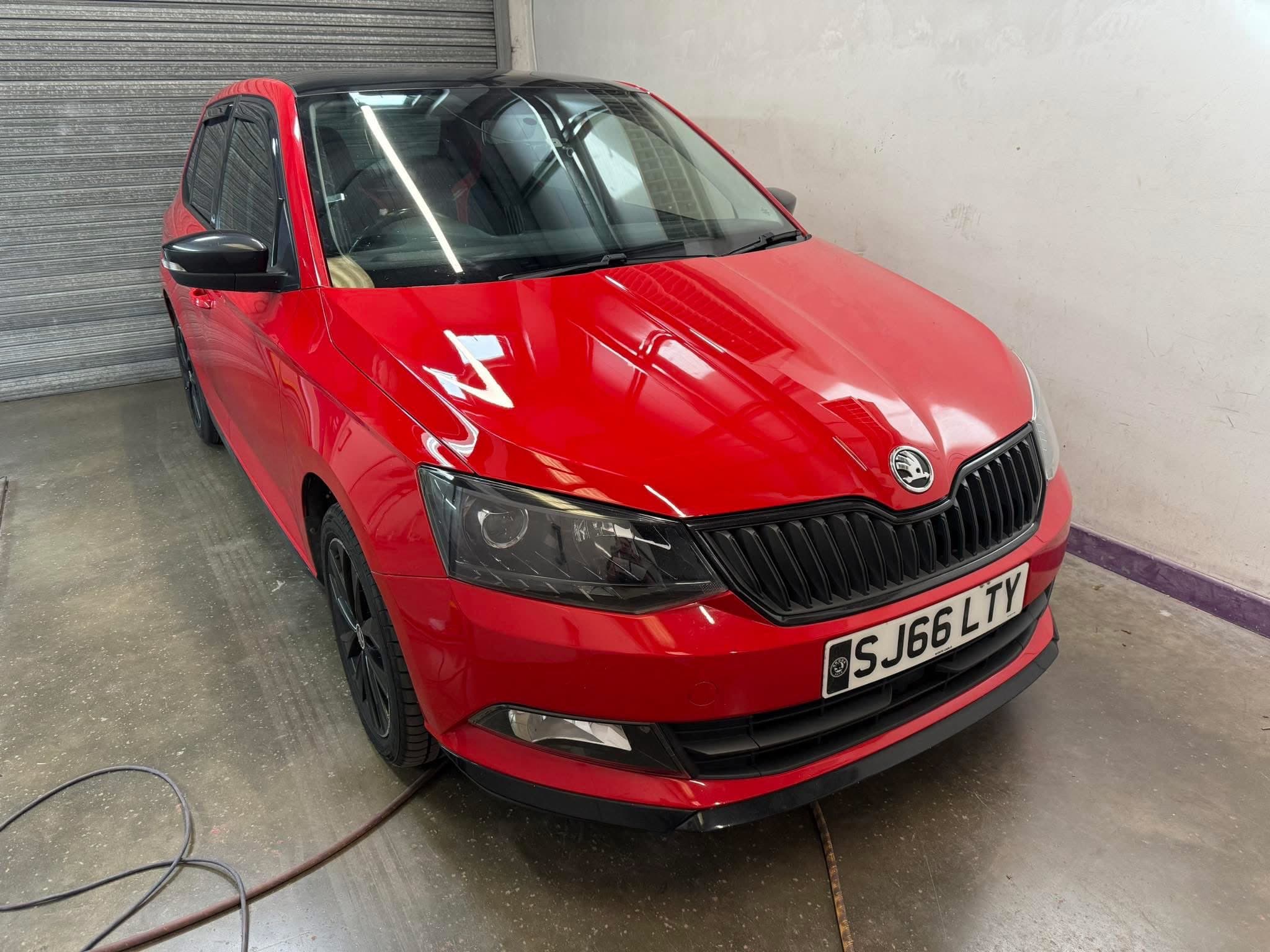 Red Skoda inside the Extreme Finishing workshop