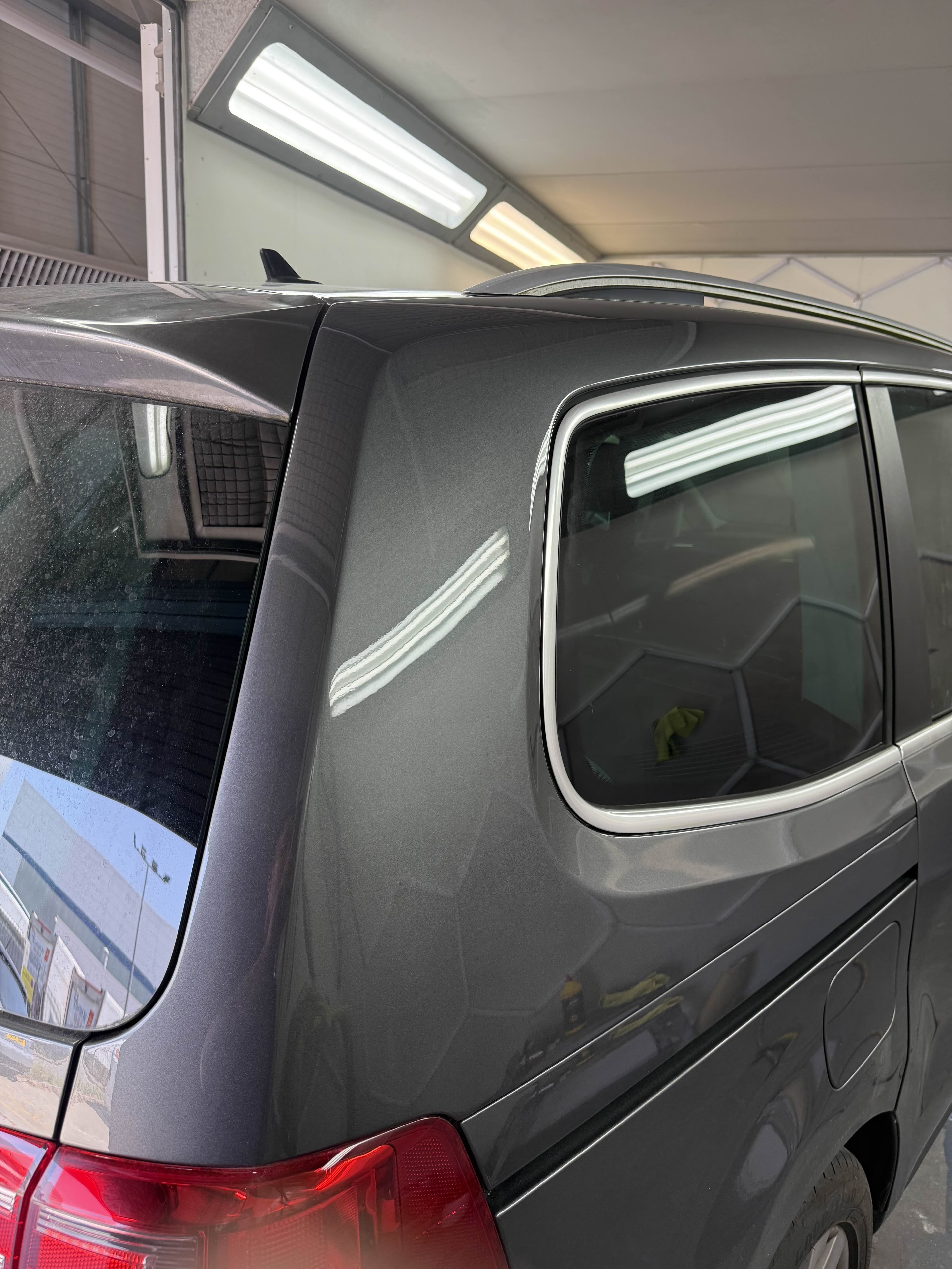 Repaired grey rear pillar after refinishing